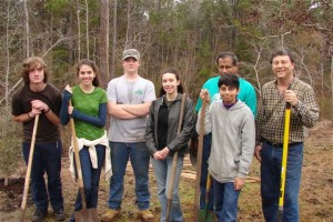 4-H members plant trees for a community service project during Arbor Day.