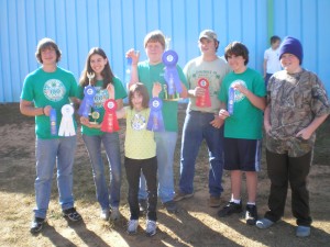 Leon County 4-H youth displaying ribbons at North Florida Fair