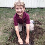 Planting a tree is an excellent way to insure clean air and water in the future.  Photo credit: Carrie Stevenson