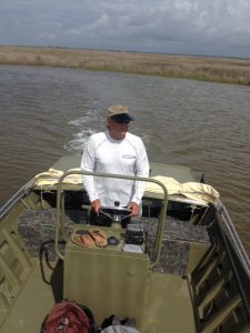 Veteran waterman and outdoor guide, Jimbo Meador, explores the marshes near Dauphin Island for the elusive diamondback terrapin. Photo: Rick O'Connor